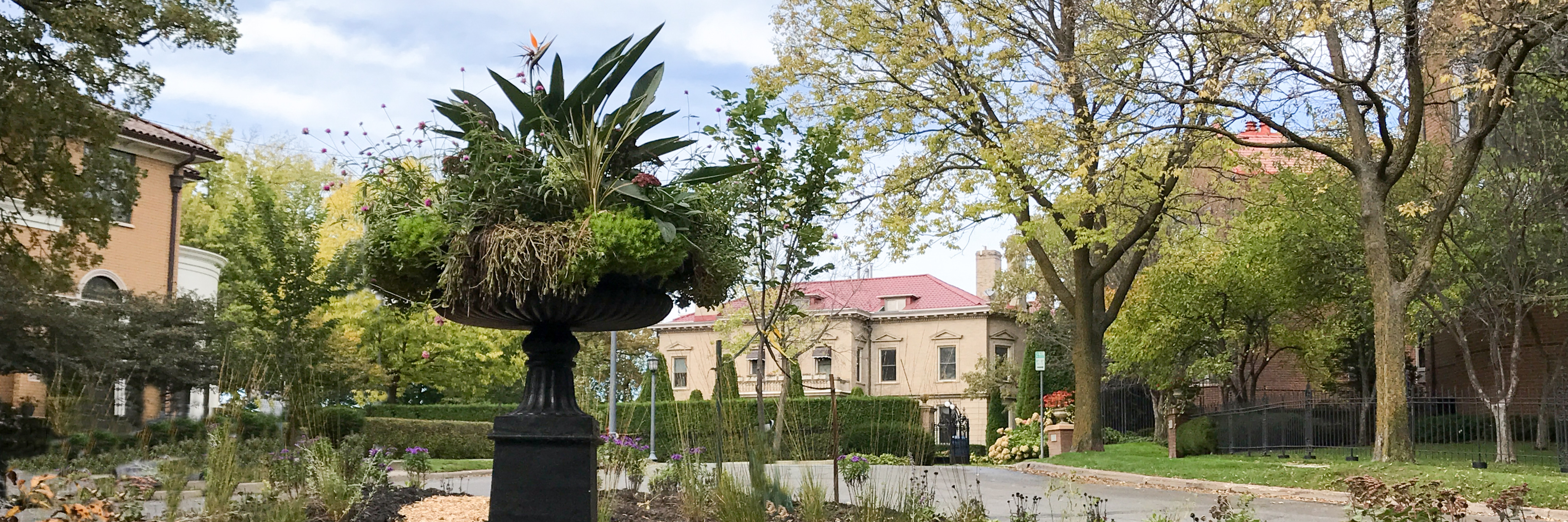Fremont Ave Triangle in Lowry Hill with Urn (wide) photo by T. D'Eramo