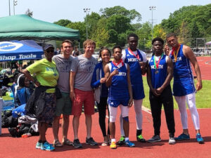 Image of Coach Skoglund and athletes